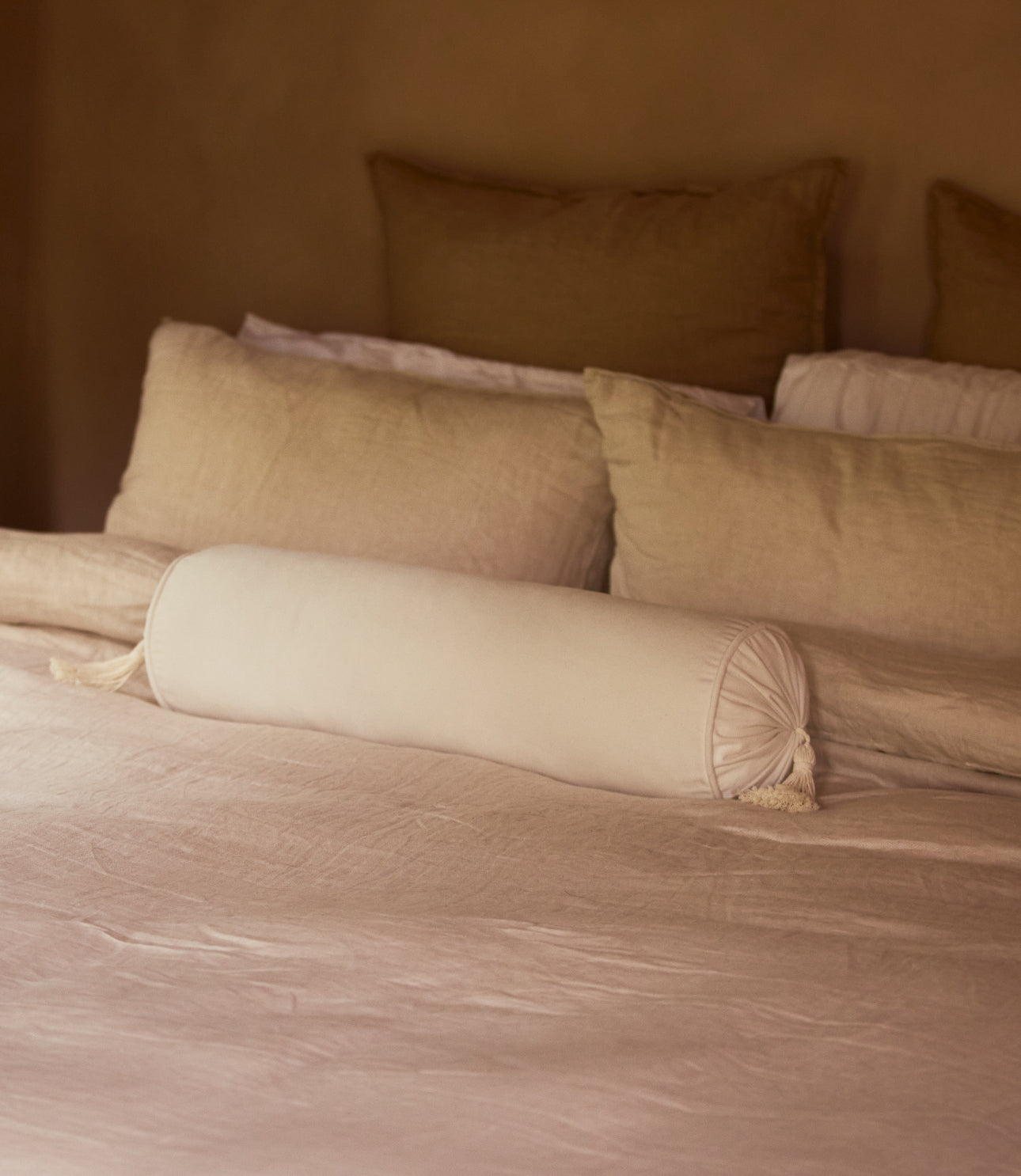 Cream Tassel Bolster
