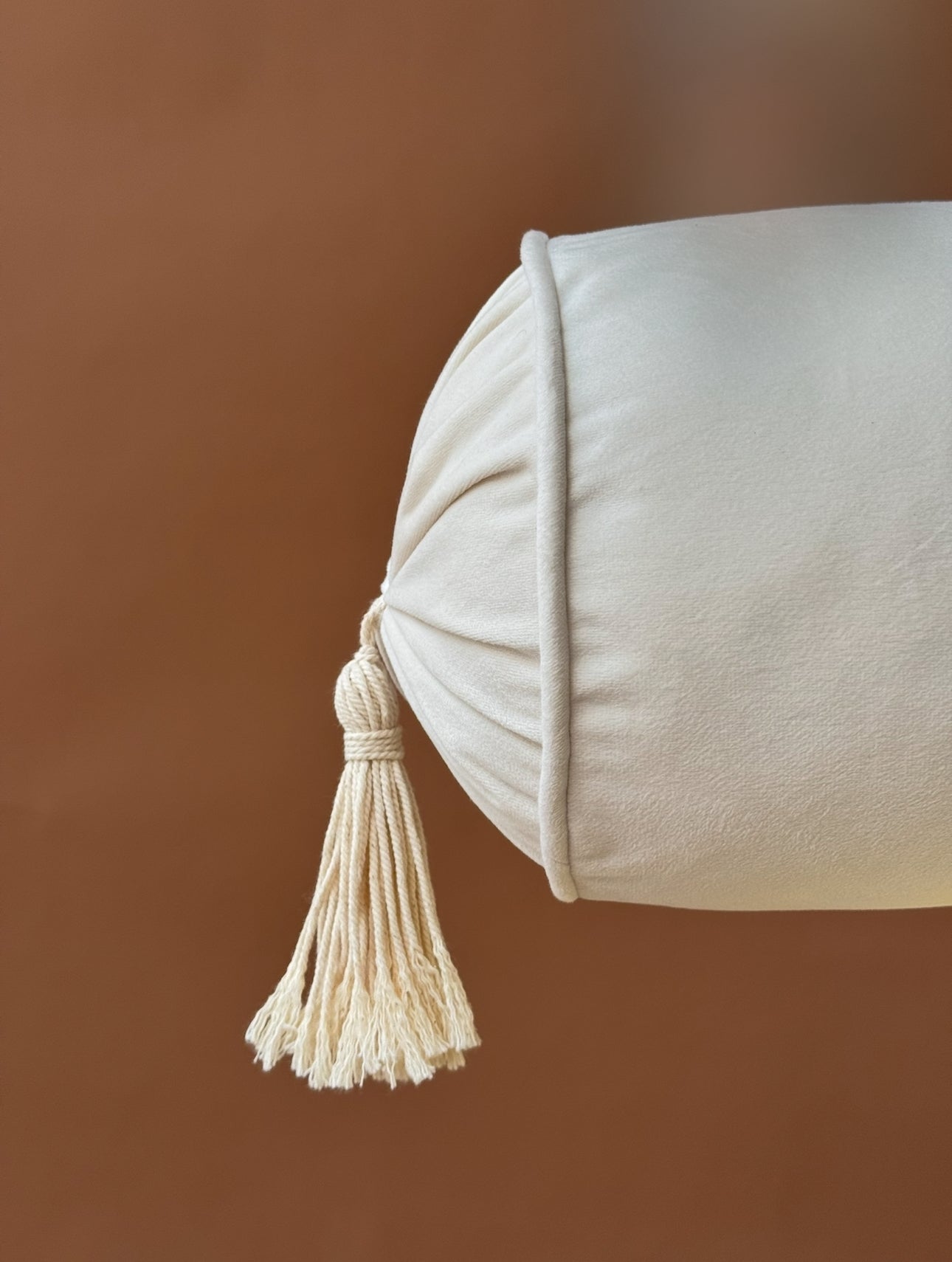Cream Tassel Bolster