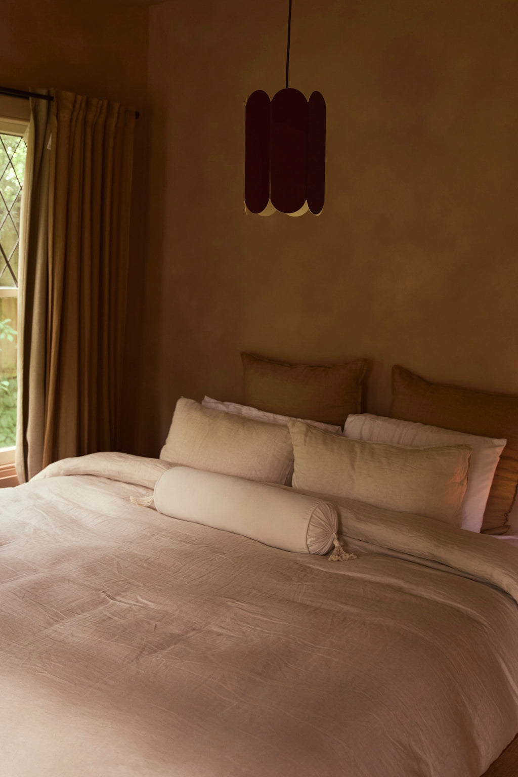 Cream Tassel Bolster